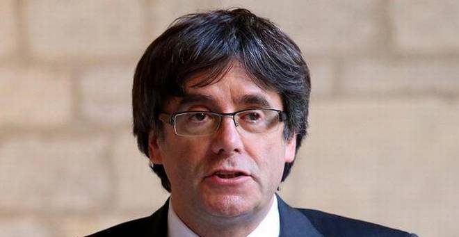 CATALONIA: Spanish PM orders court to block Puigdemont's nomination as regional president