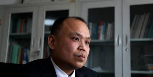 China charges detained rights lawyer with subversion of power