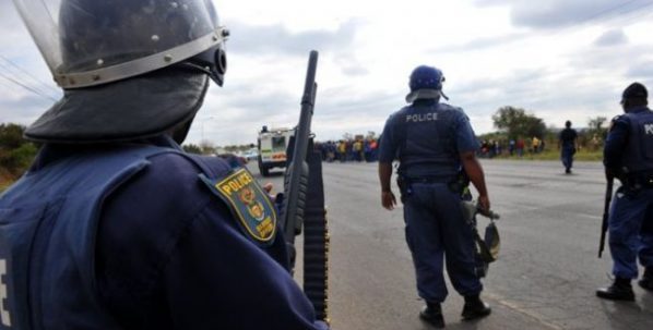 7 suspects accused of killing South African police officers killed in church gunfight