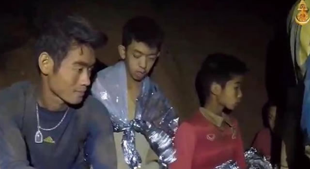 All 12 boys, coach rescued from Thai cave