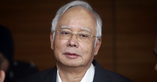 Former Malaysia PM slammed with money laundering charges