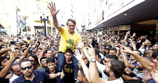 Stabbed Brazilian presidential candidate recovering, leads opinion poll