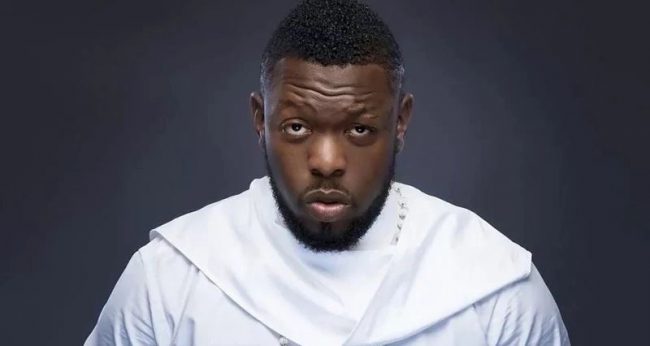 Timaya gets knocks for advising Phyno to impregnate a lady, shun marriage