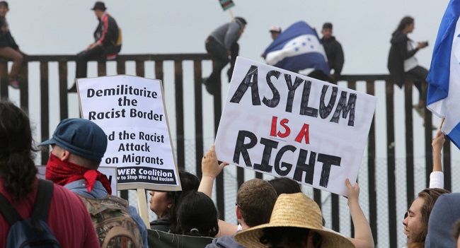 Desperate asylum seekers, migrants risk detention after breaching US border
