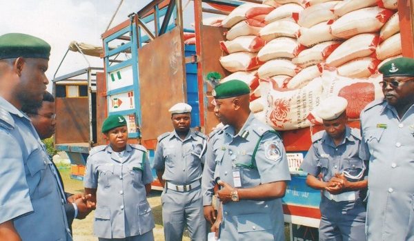 Navy hands over 470 bags contraband rice, 7 suspected smugglers to Customs