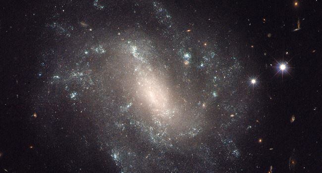 Universe expanding faster than earlier thought, Hubble data reveals