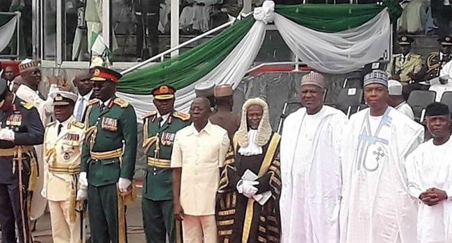 Oshiomhole goofs, gets embarrassed at President Buhari’s inauguration