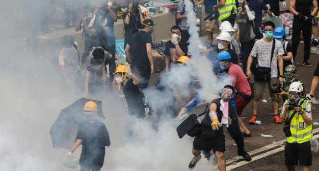 Police fire rubber bullets, tear gas in violent clash with protesters in Hong Kong