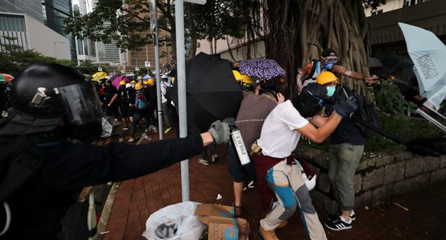 HONG KONG: Thousands of protesters defy rally ban, return to scene of gang attack