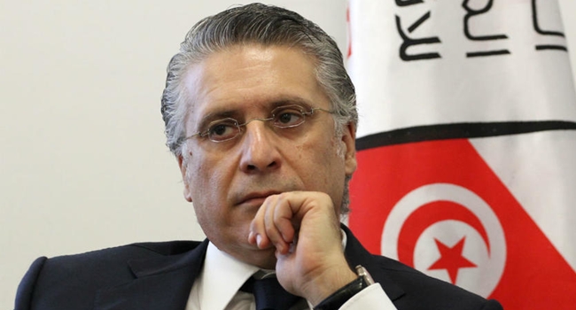TUNISIA: Opposition candidate Karoui’s supporters finger PM Chahed as mastermind of media mogul's arrest