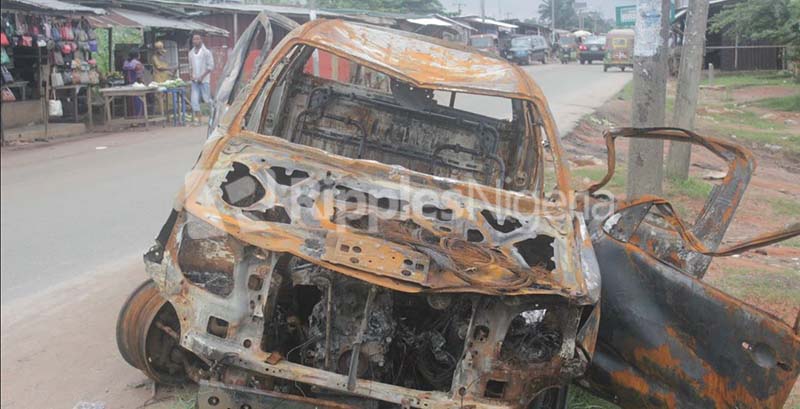 The burnt police truck. Photo by Patrick Egwu