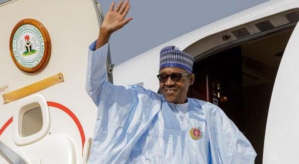 buhari waving