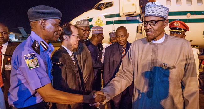 Buhari returns to Abuja from Japan