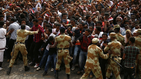 Police arresting protesters in the Oromia region of Ethiopia