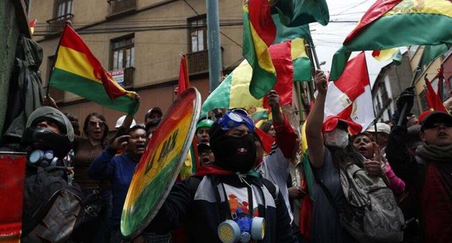 Bolivia policemen join protest against Morales