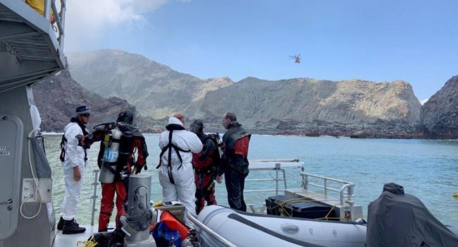 New Zealand divers search contaminated waters for volcano victims
