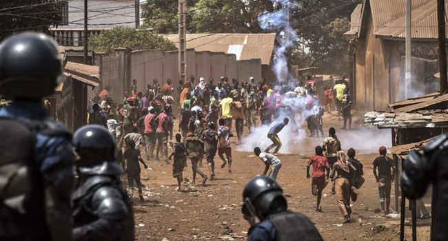 GUINEA: Opposition attack polling station, clash with police to disrupt referendum