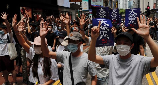 Activists raise fears as China passes security law on Hong Kong