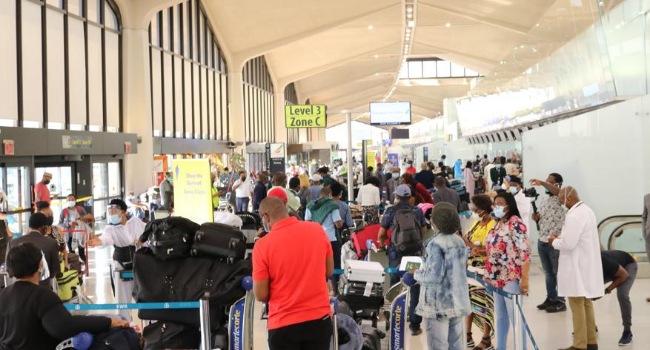 Another 322 Nigerians return from US over COVID-19 scare