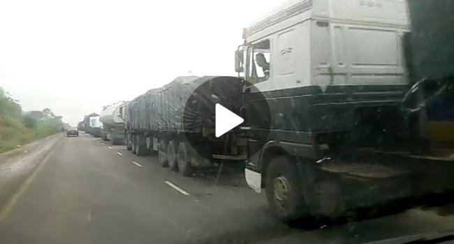 Travellers stranded, groan as trucks block Lokoja-Abuja highway (Video)