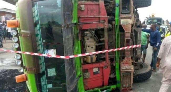 LAGOS: Two persons feared dead, others injured as container falls on bus