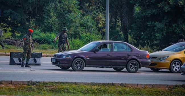 Soldiers block access roads to #EndSARS venues, as police beat protesters