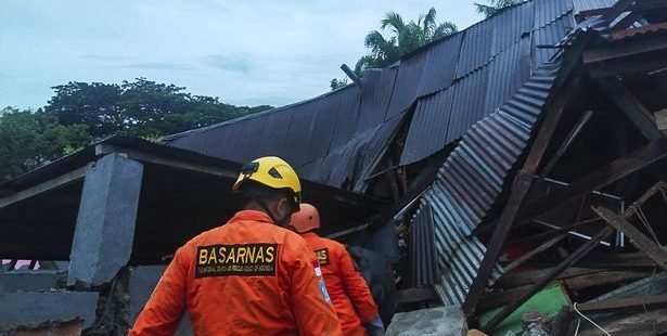 Death toll from Indonesia earthquake hits 56, as rescue operatives search for more bodies