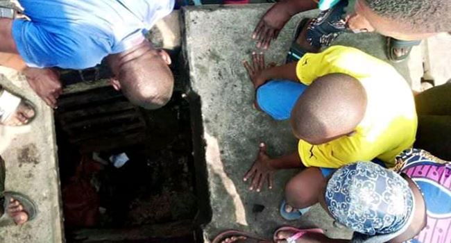 Lagos residents discover tunnel allegedly used by kidnappers, ritualists, beat suspect to death