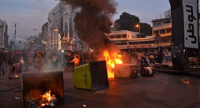 Dozen injured in Lebanon as police, anti-lockdown protesters clash