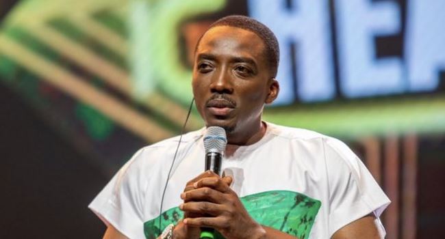 Nigerian comedian, Bovi, makes statement with 'bloody flag' attire at #14thHeadies