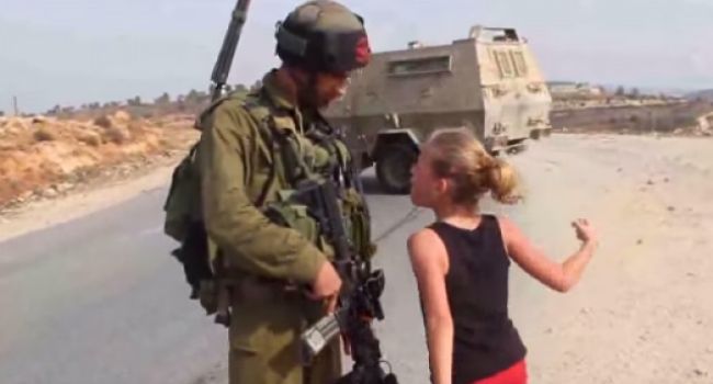FACT CHECK: What’s the story behind a viral video of a girl confronting a Russian soldier in Ukraine?