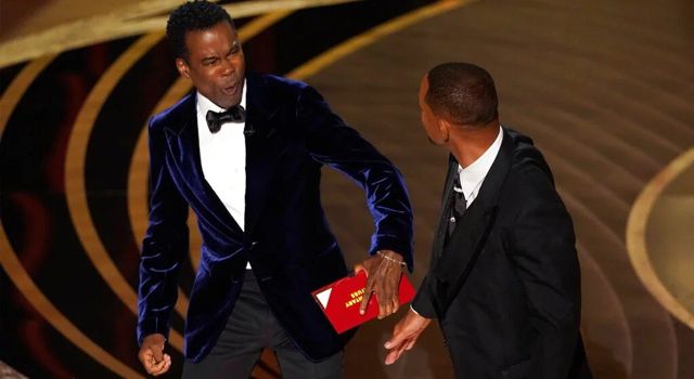 Actor Will Smith slaps comedian Chris Rock on stage at 2022 Oscars (Video)
